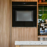 Moderne Keuken met Diresco Terrazzo en RVS Accessoires-OBLY-Moderne Keukenrenovatie met Diresco Terrazzo en RVS Accessoires-OBLY