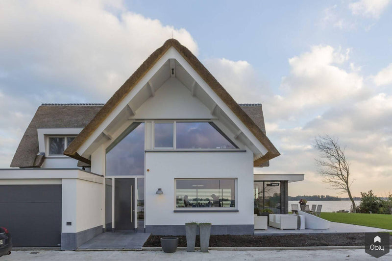 Glazen schuifpui woning aan het water-KELLER minimal windows® by Kumasol-alle,Exterieur vrijstaand,Vrijstaand-Glazen schuifpui woning aan het water | OBLY.com-OBLY