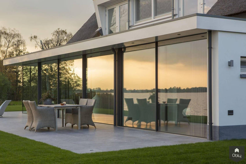 Glazen schuifpui woning aan het water-KELLER minimal windows® by Kumasol-alle,Exterieur vrijstaand,Vrijstaand-Glazen schuifpui woning aan het water | OBLY.com-OBLY