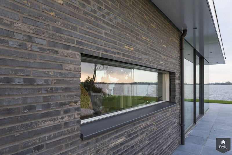 Glazen schuifpui woning aan het water-KELLER minimal windows® by Kumasol-alle,Exterieur vrijstaand,Vrijstaand-Glazen schuifpui woning aan het water | OBLY.com-OBLY