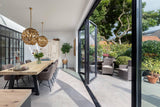 Luxe serreaanbouw met brede vouwwand-Busscher Serrebouw-Aanbouw-OBLY